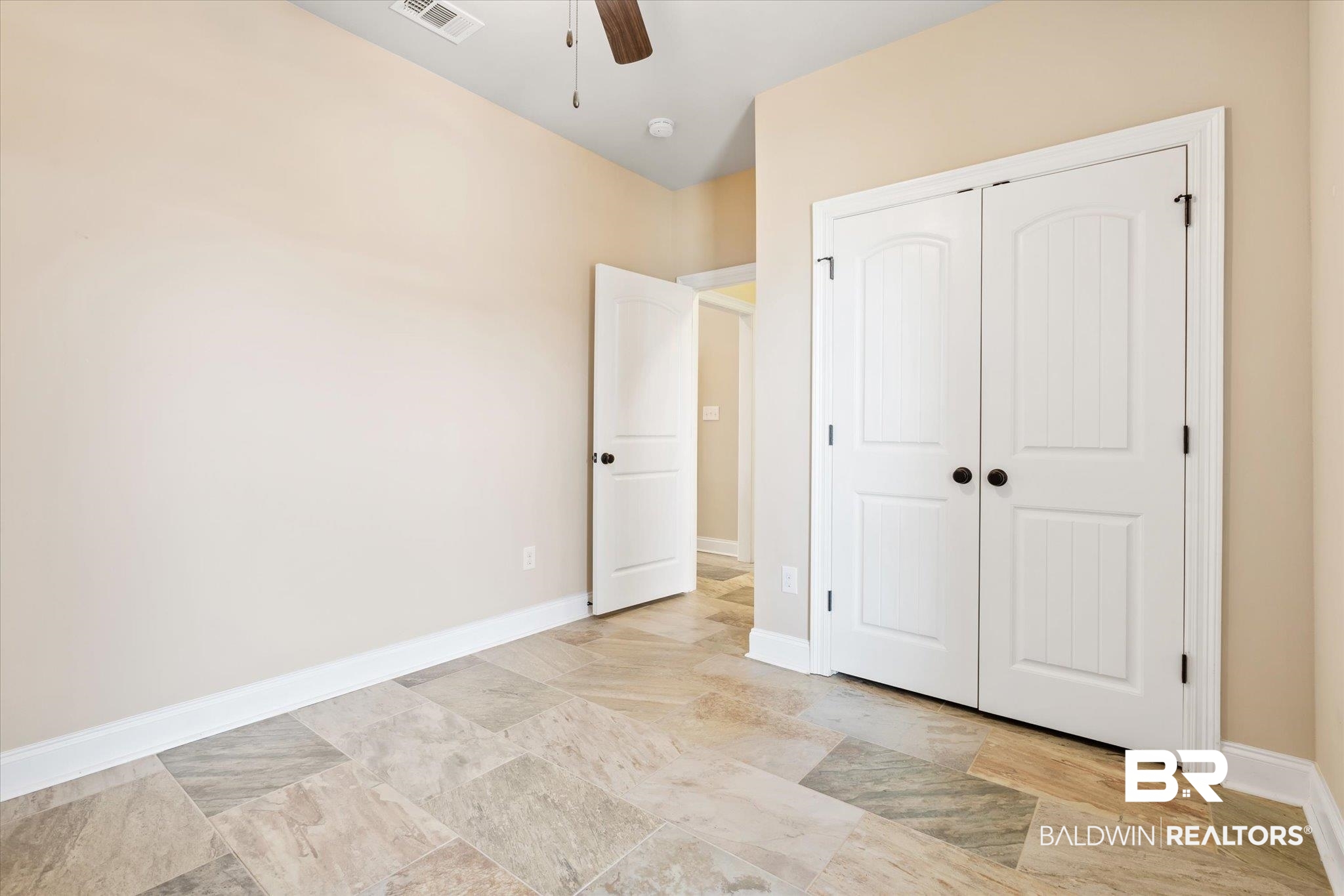 423 Breckin Drive Fairhope, AL 36532 - Photo 26 of 31 Unfurnished bedroom with a closet and ceiling fan