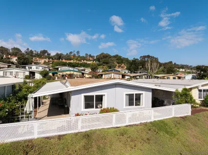 a view of living room with furniture and rug