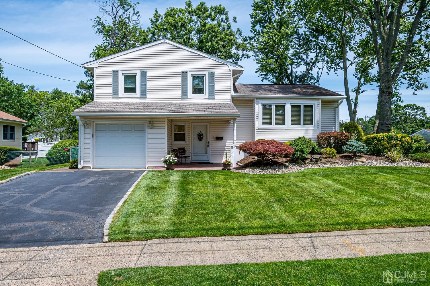 20 Rieder Road Edison, NJ 08817 - Photo 2 of 40 a front view of a house with a yard