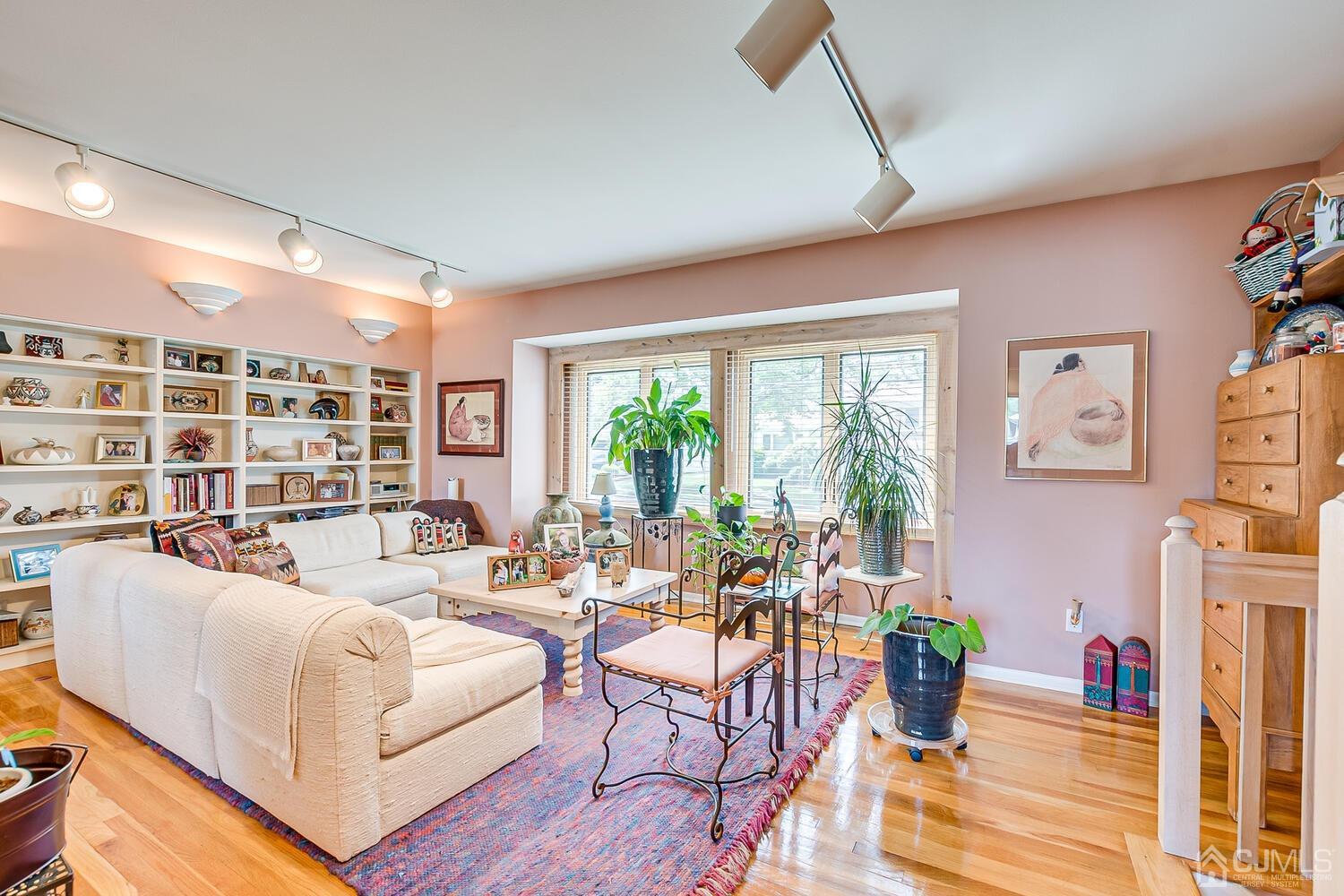 20 Rieder Road Edison, NJ 08817 - Photo 11 of 40 a living room with furniture and large windows