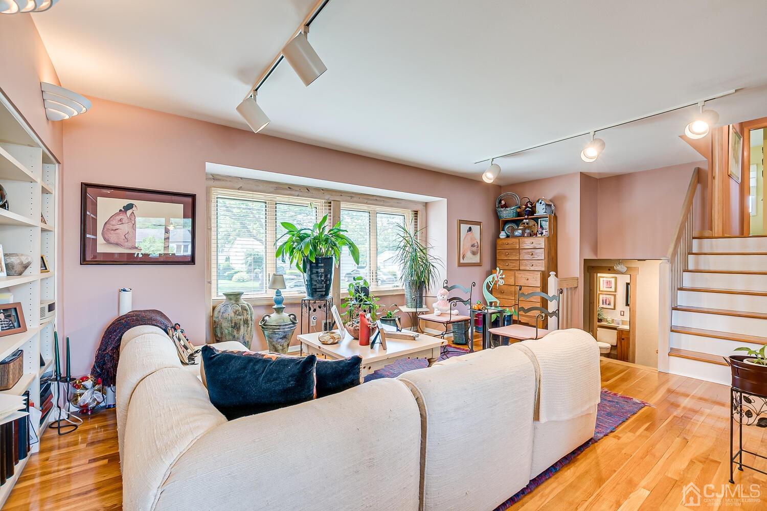 20 Rieder Road Edison, NJ 08817 - Photo 12 of 40 a living room with furniture fireplace and a large window
