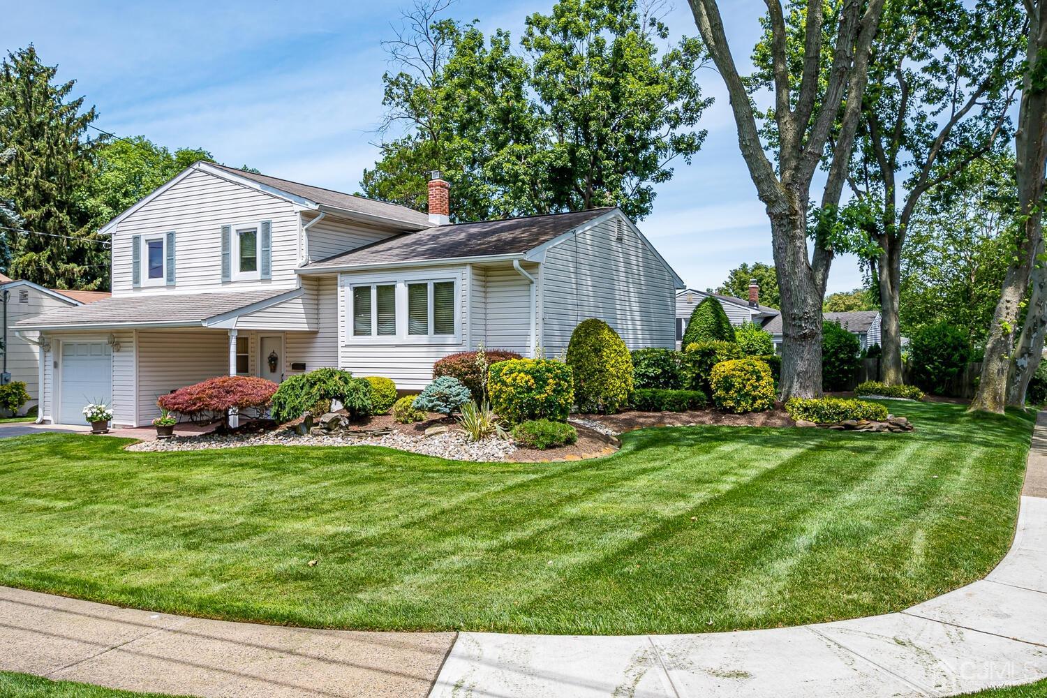 20 Rieder Road Edison, NJ 08817 - Photo 3 of 40 a front view of a house with a yard