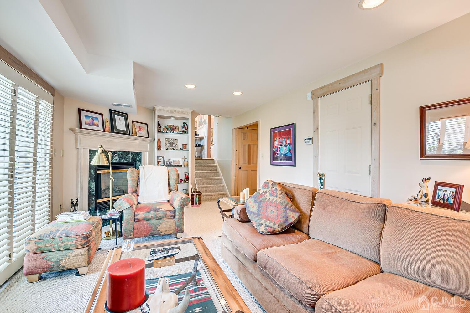 20 Rieder Road Edison, NJ 08817 - Photo 25 of 40 a living room with furniture or couch and a bookshelf