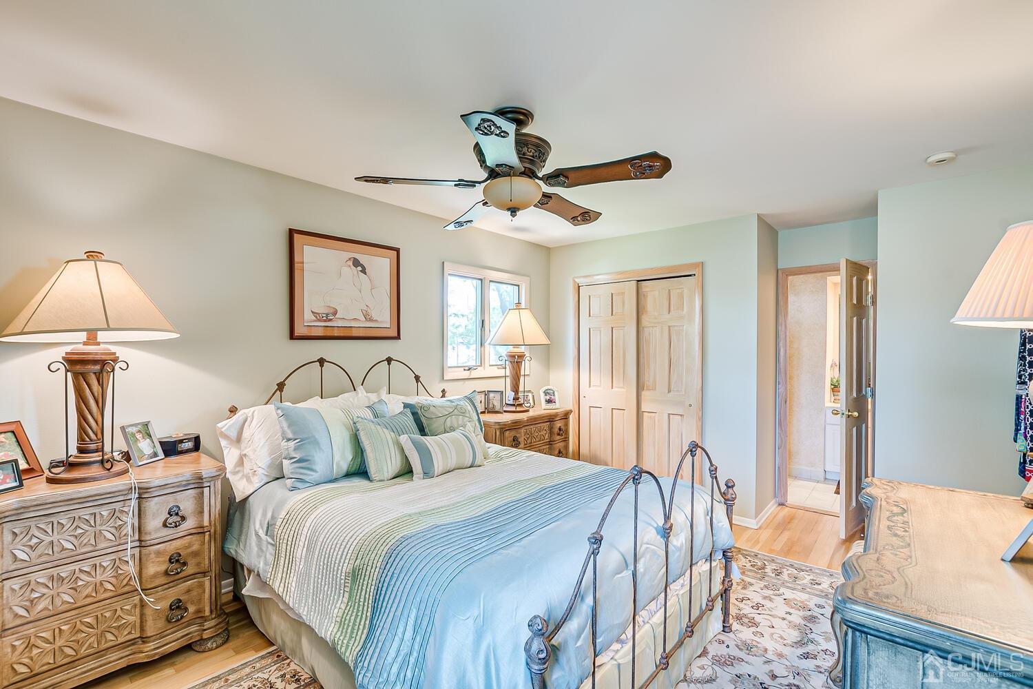 20 Rieder Road Edison, NJ 08817 - Photo 29 of 40 a bedroom with a bed and a chandelier