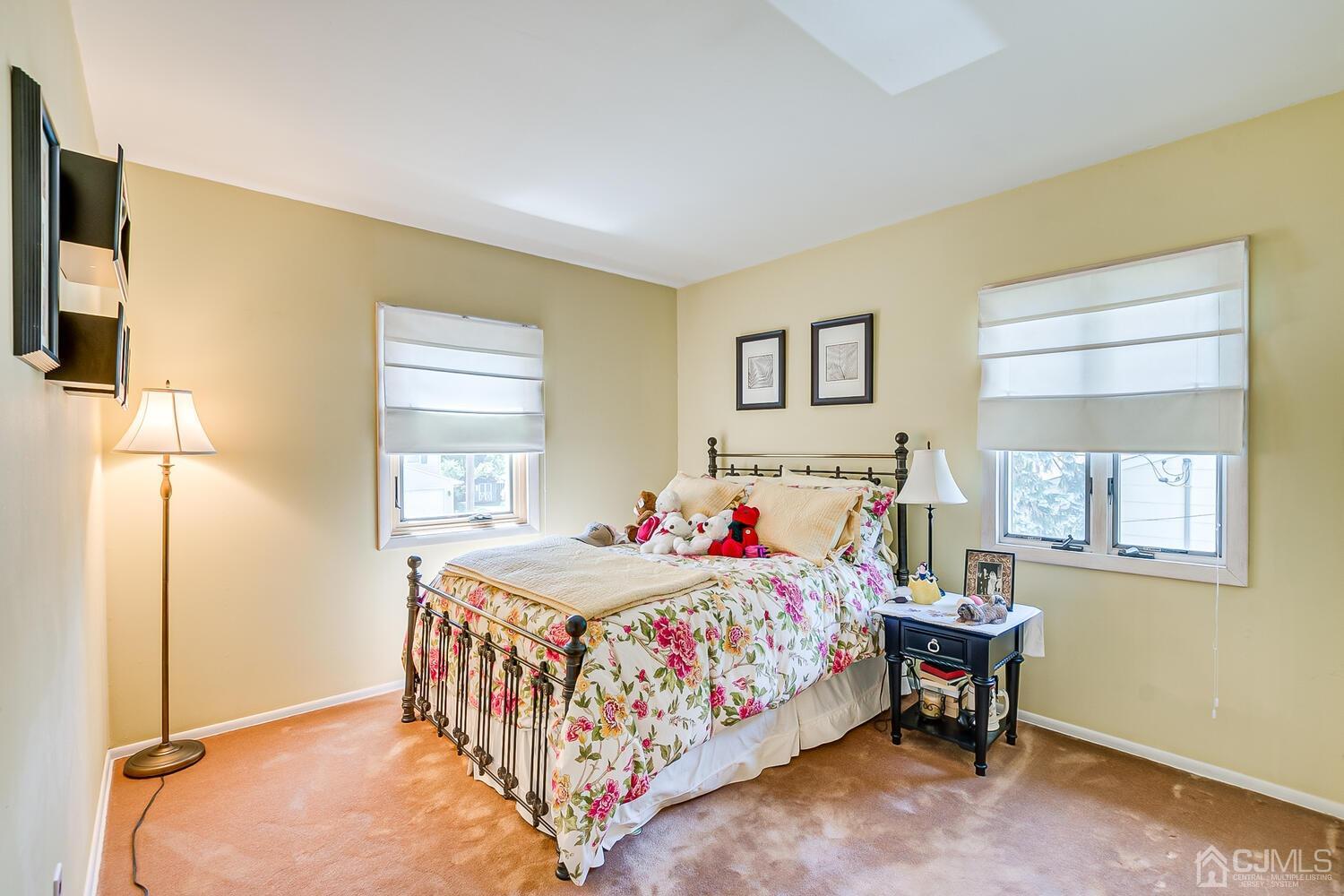 20 Rieder Road Edison, NJ 08817 - Photo 31 of 40 a bedroom with a bed and a dresser