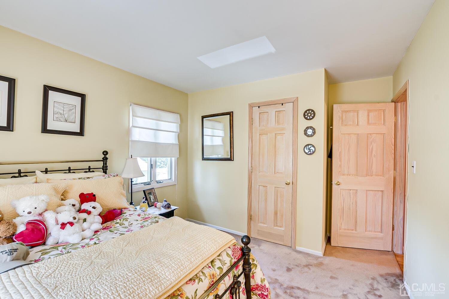 20 Rieder Road Edison, NJ 08817 - Photo 32 of 40 a bedroom with a bed and dresser