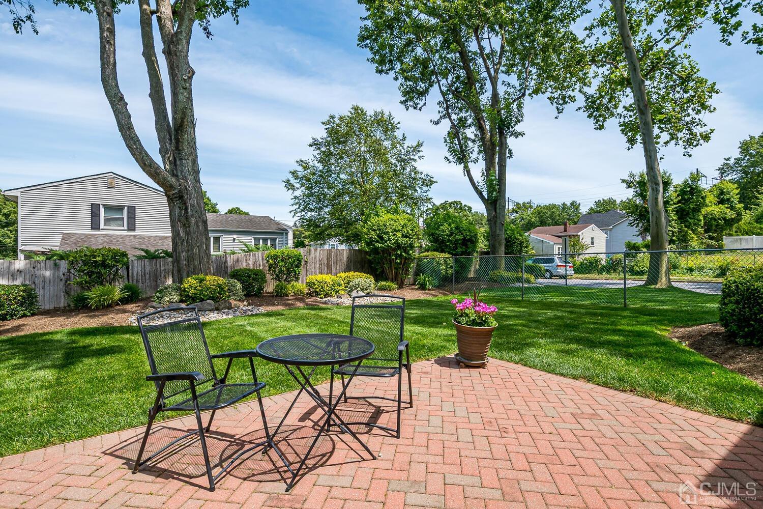 20 Rieder Road Edison, NJ 08817 - Photo 35 of 40 a view of a chairs and table in the garden