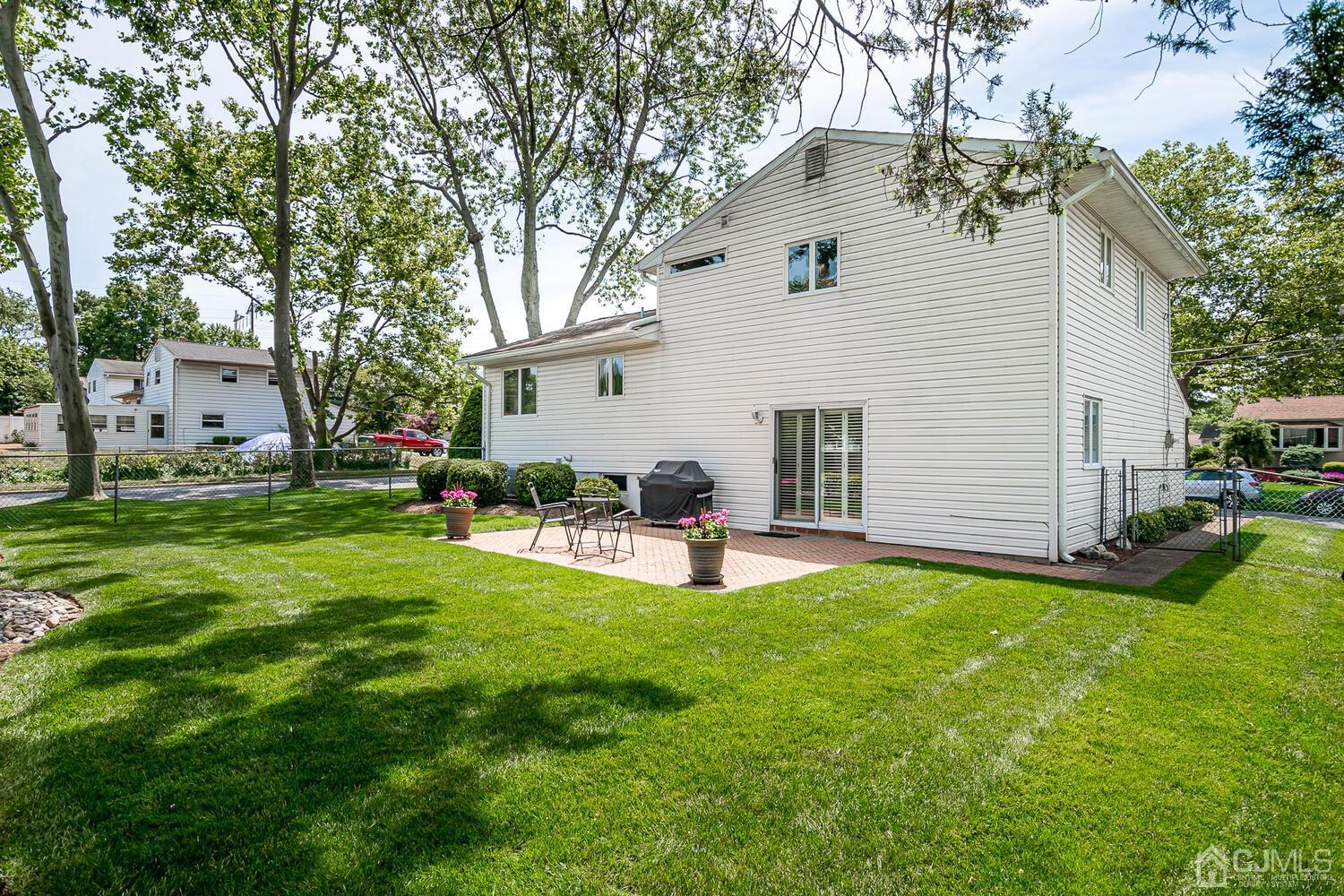 20 Rieder Road Edison, NJ 08817 - Photo 36 of 40 a view of a house with backyard sitting area and garden