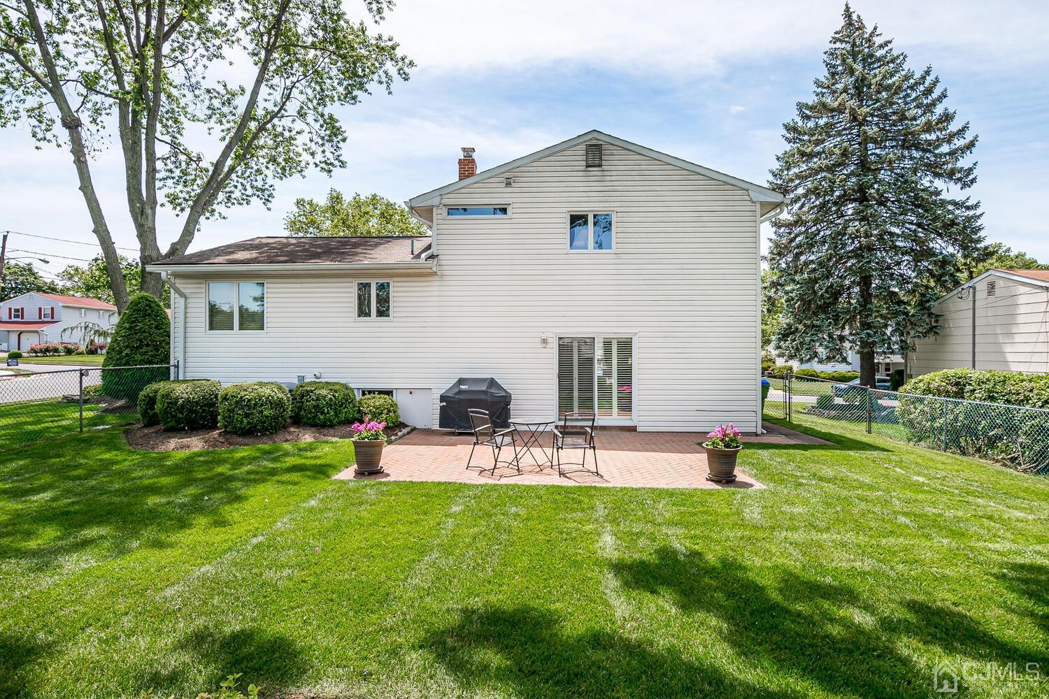 20 Rieder Road Edison, NJ 08817 - Photo 37 of 40 a view of a house with a yard and sitting area
