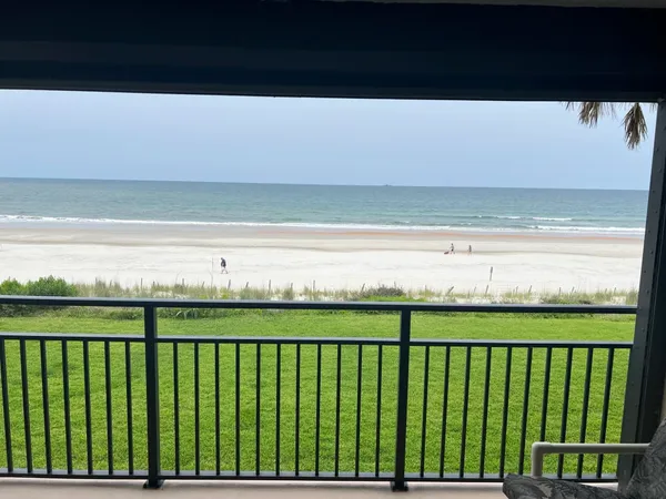 a view of ocean from a balcony