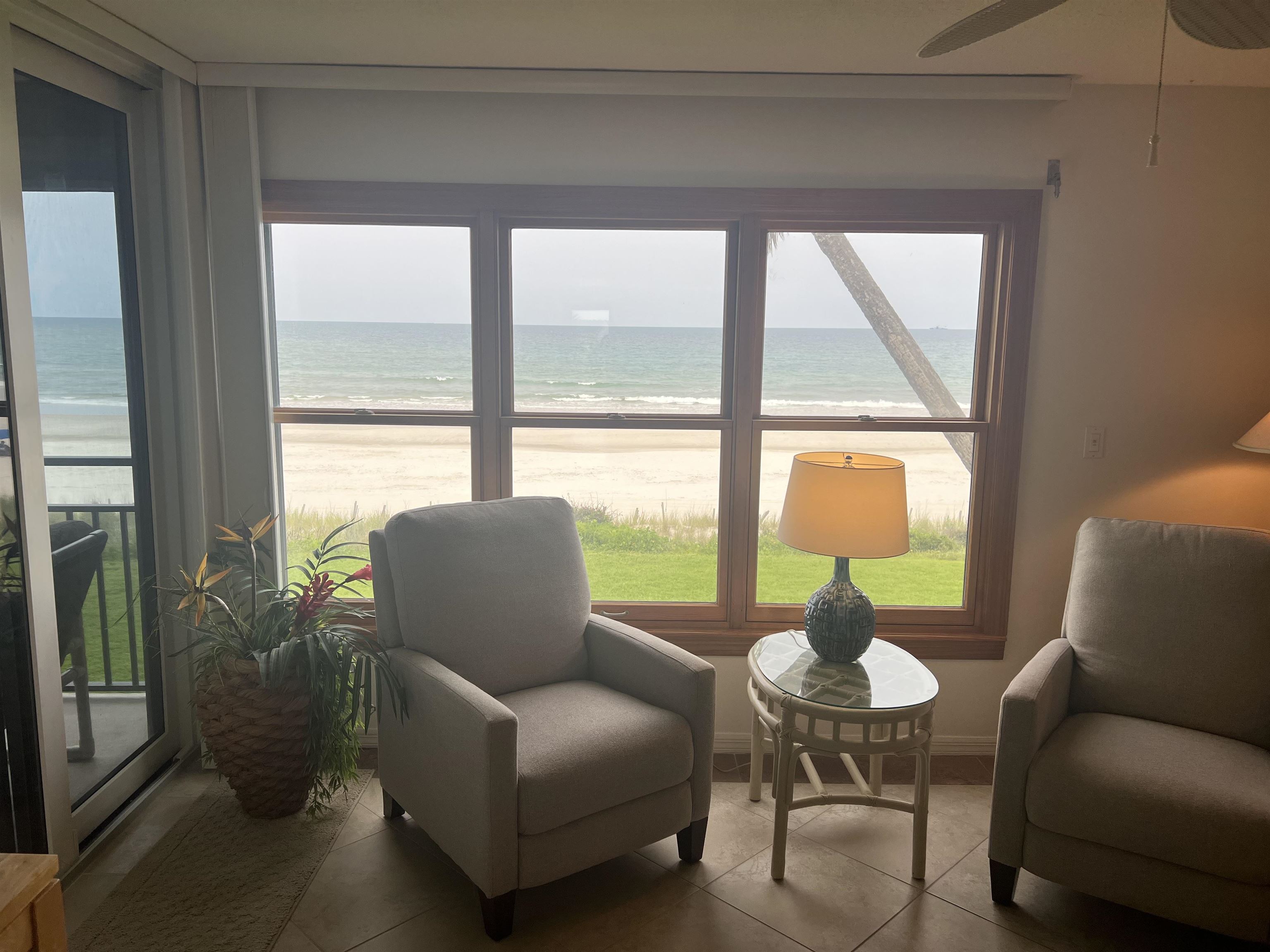 8050 A1A South St. Augustine, FL 32080 - Photo 12 of 25 a living room with furniture and a large window
