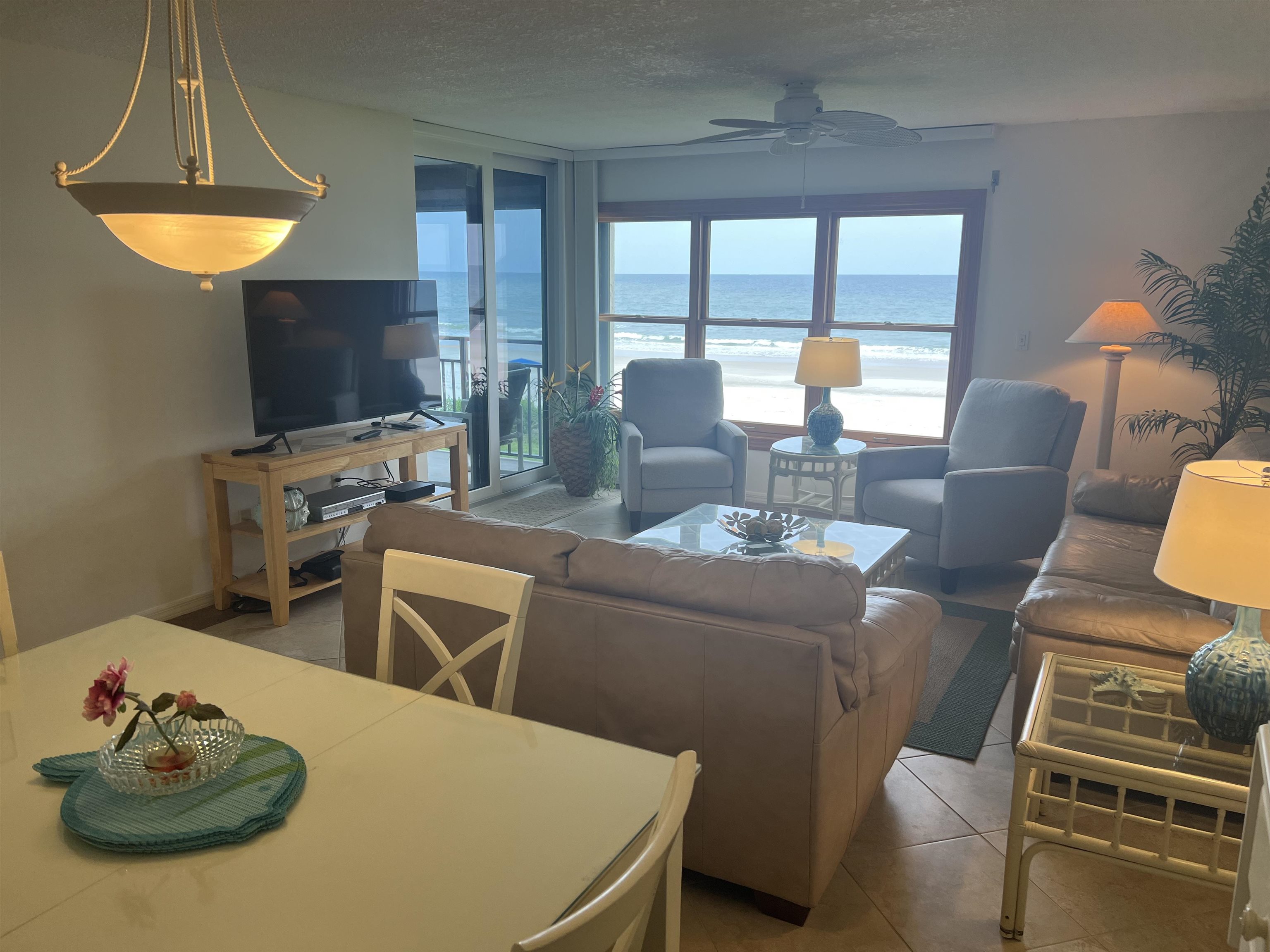 8050 A1A South St. Augustine, FL 32080 - Photo 14 of 25 a living room with furniture a window and a table