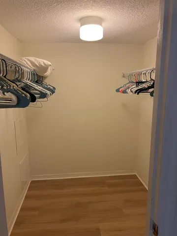 a view of a room with racks on the wall