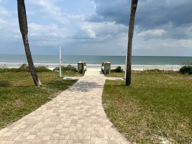 a view of a swimming pool with a sitting space