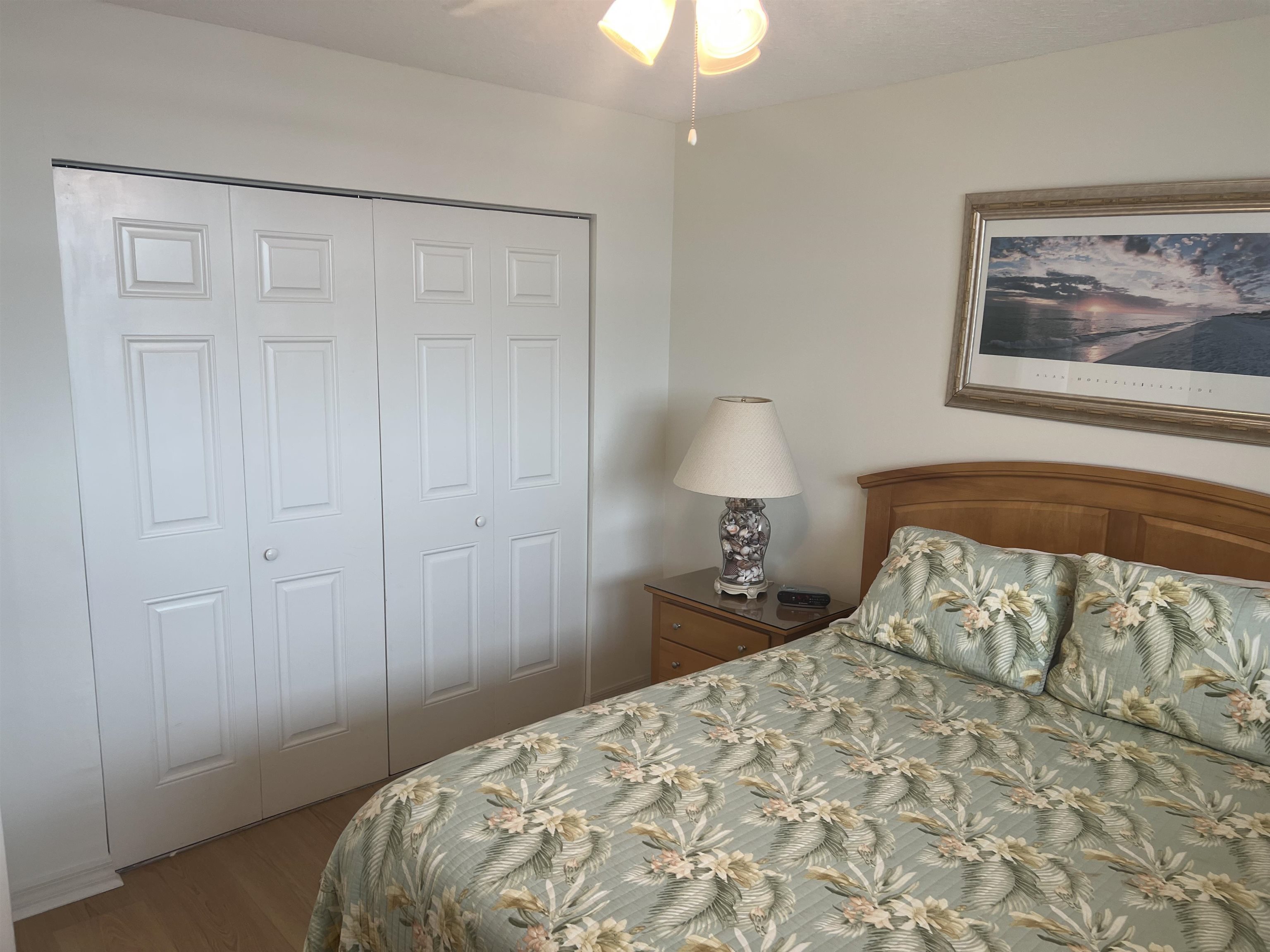 8050 A1A South St. Augustine, FL 32080 - Photo 4 of 25 a bedroom with a bed and a painting on the wall