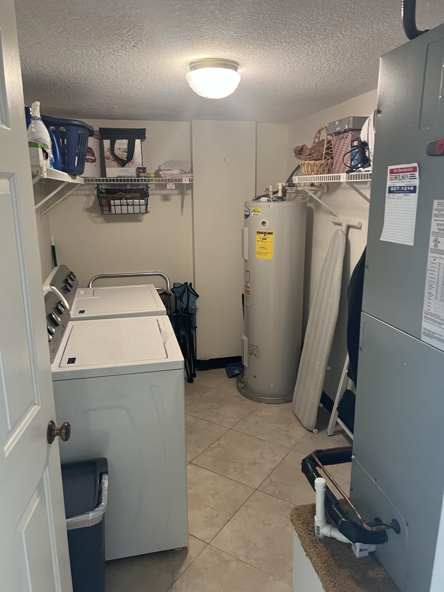 8050 A1A South St. Augustine, FL 32080 - Photo 9 of 25 a utility room with dryer and washer