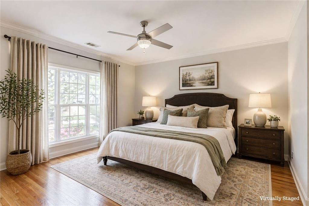 124 Dumar Lane Hoschton, GA 30548 - Photo 16 of 49 a bedroom with a large bed and a window