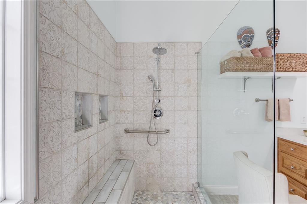 124 Dumar Lane Hoschton, GA 30548 - Photo 18 of 49 a bathroom with a granite countertop shower