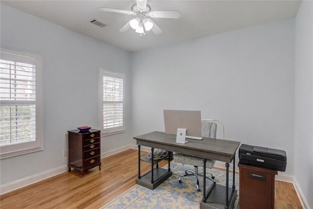 124 Dumar Lane Hoschton, GA 30548 - Photo 20 of 49 a view of a workspace with furniture and a window