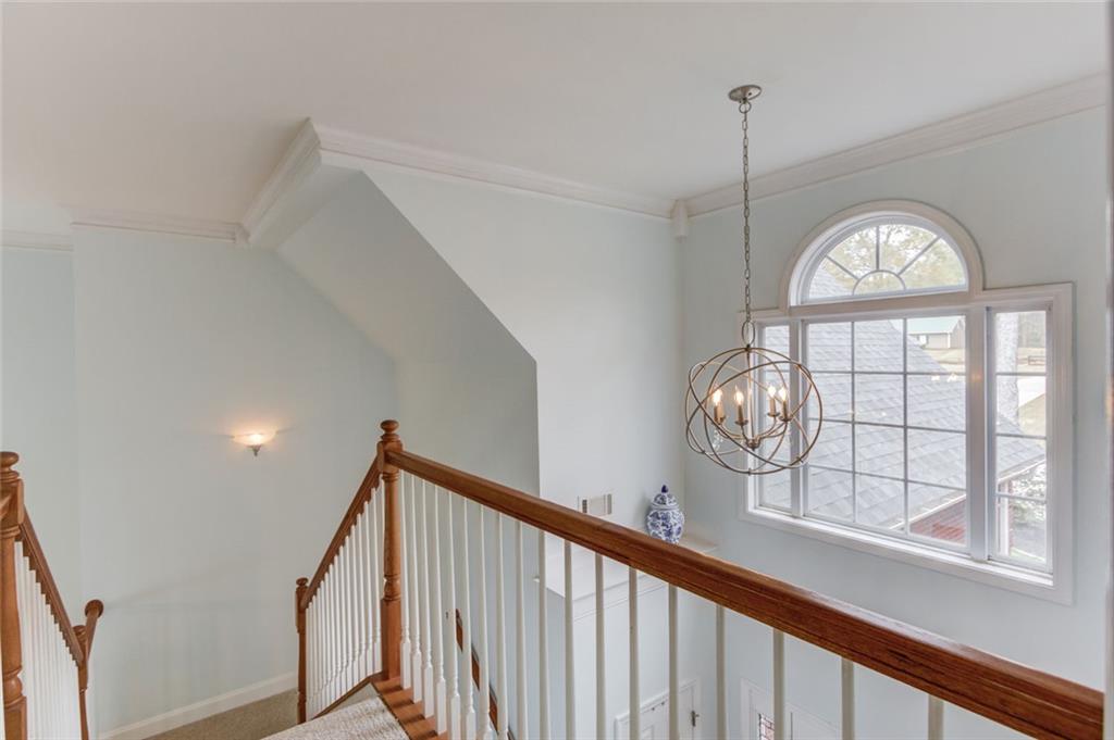 124 Dumar Lane Hoschton, GA 30548 - Photo 26 of 49 a view of an entryway door with wooden floor