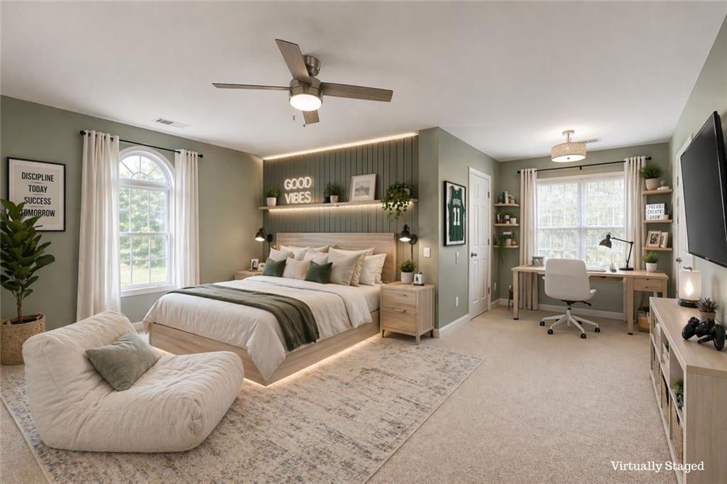 124 Dumar Lane Hoschton, GA 30548 - Photo 29 of 49 a bedroom with furniture and a large window