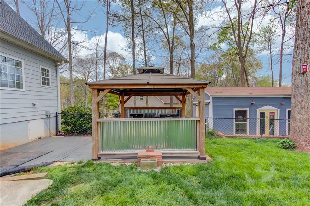 124 Dumar Lane Hoschton, GA 30548 - Photo 40 of 49 a view of a house with a yard