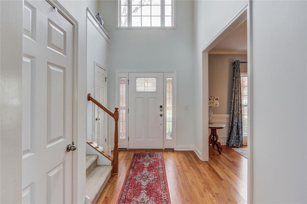 124 Dumar Lane Hoschton, GA 30548 - Photo 4 of 49 a view of an entryway with a workspace