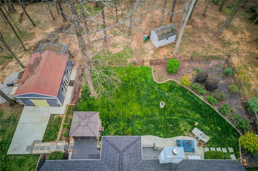124 Dumar Lane Hoschton, GA 30548 - Photo 47 of 49 an aerial view of a house with a yard
