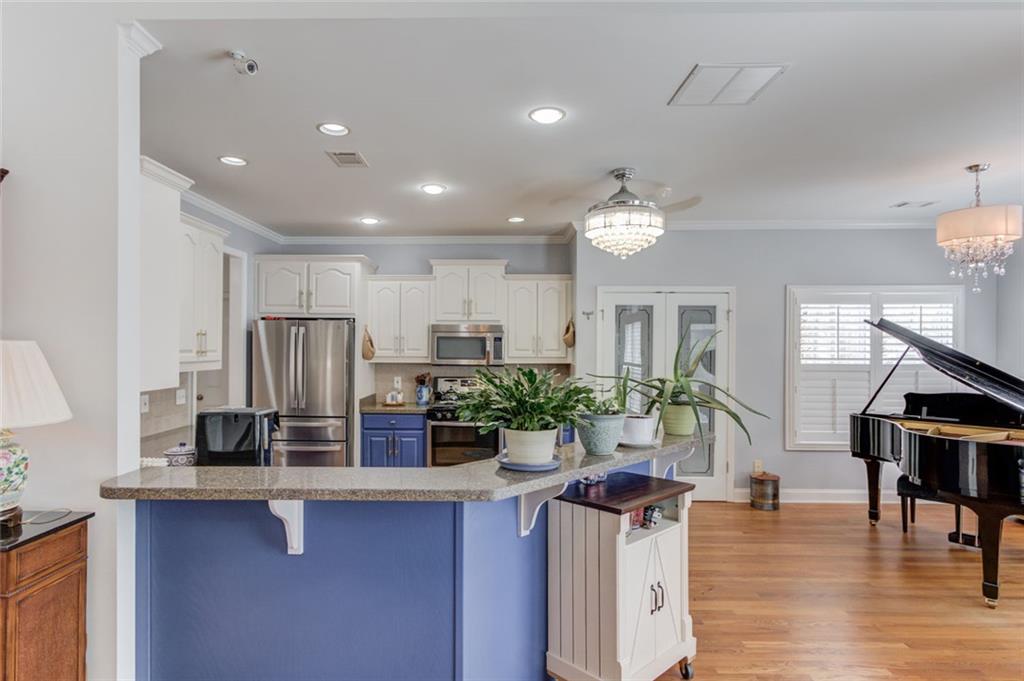124 Dumar Lane Hoschton, GA 30548 - Photo 10 of 49 a view of kitchen with sink and refrigerator