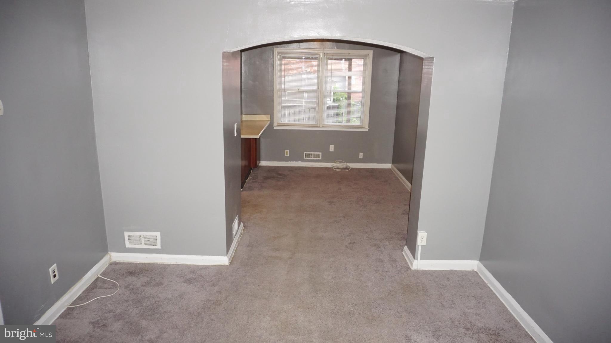 3436 Dunran Road Dundalk, MD 21222 - Photo 6 of 25 an empty room with windows