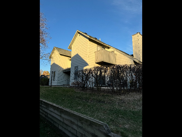 583 Dunham Road Gurnee, IL 60031 - Photo 1 of 25 a view of a back yard of the house