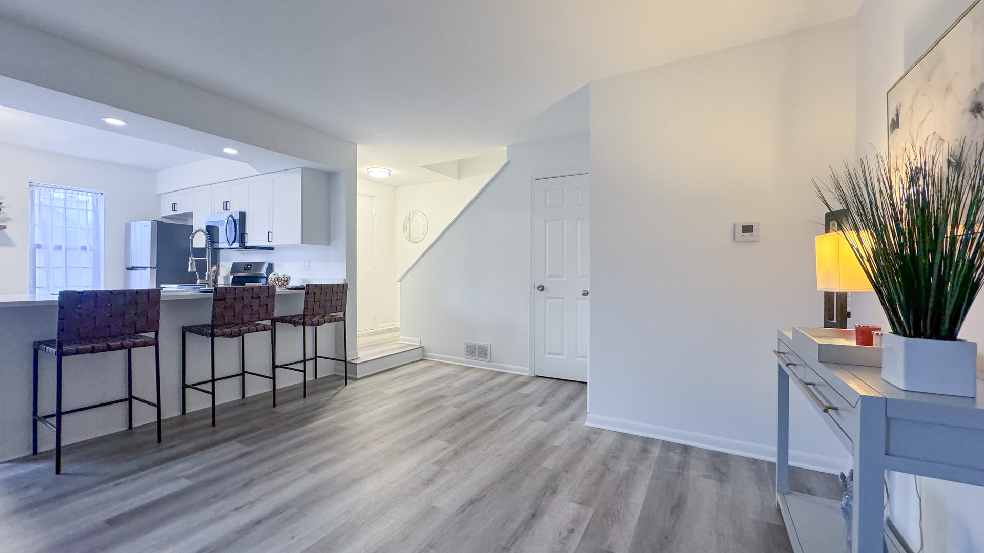 583 Dunham Road Gurnee, IL 60031 - Photo 12 of 25 a view of a workspace with furniture and wooden floor
