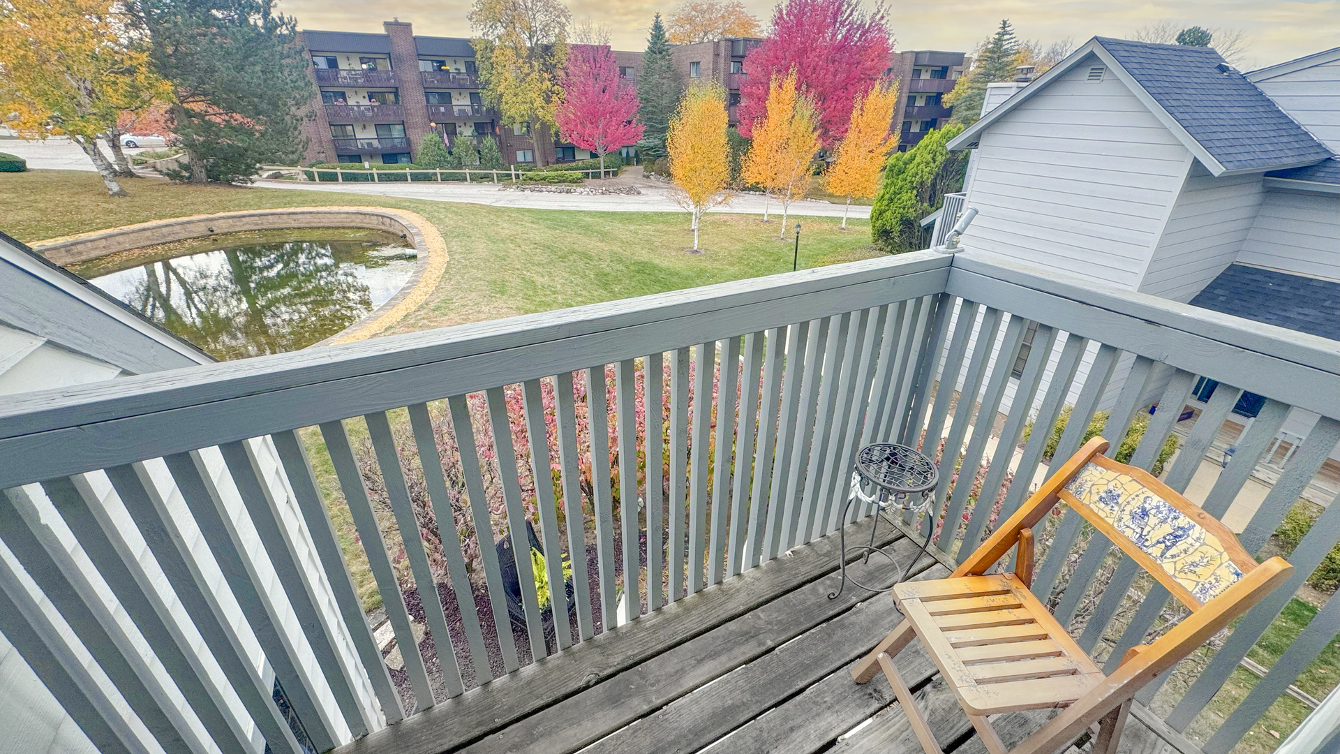 583 Dunham Road Gurnee, IL 60031 - Photo 21 of 25 a view of a balcony with wooden floor and fence