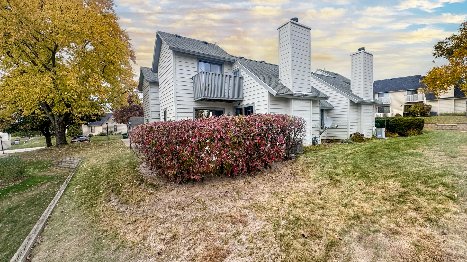 583 Dunham Road Gurnee, IL 60031 - Photo 24 of 25 a view of a house with a yard and sitting area
