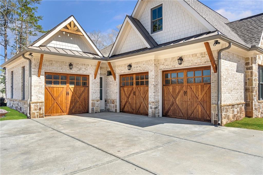 254 Fortress Way Jefferson, GA 30549 - Photo 11 of 69 a front view of a house with a garage