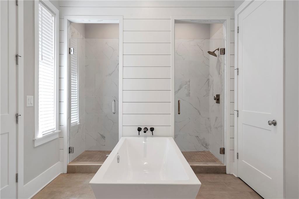 254 Fortress Way Jefferson, GA 30549 - Photo 32 of 69 a bathroom with a sink a toilet and shower