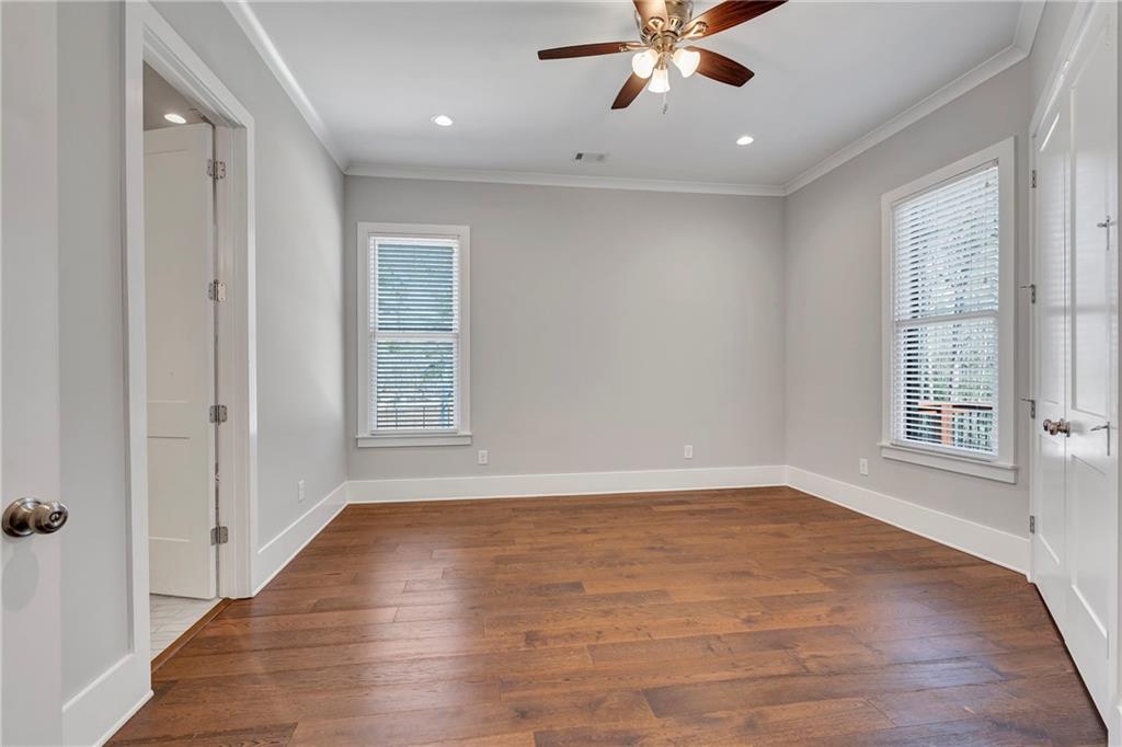 254 Fortress Way Jefferson, GA 30549 - Photo 39 of 69 a view of an empty room with a window and wooden floor