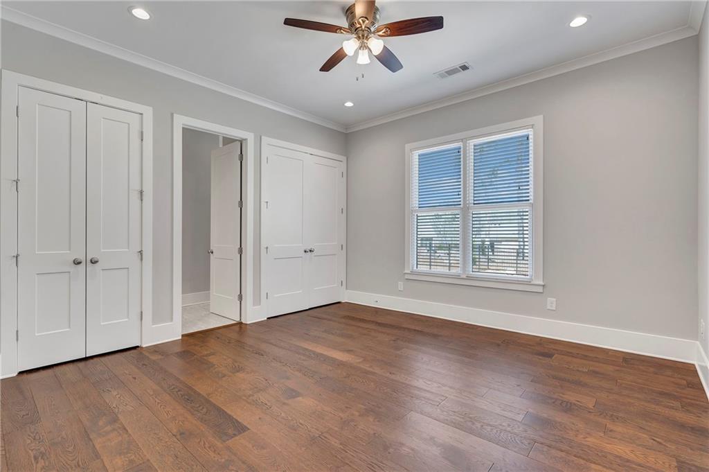 254 Fortress Way Jefferson, GA 30549 - Photo 42 of 69 a view of an empty room with a window and wooden floor