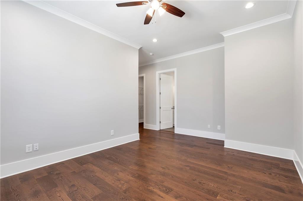 254 Fortress Way Jefferson, GA 30549 - Photo 45 of 69 a view of an empty room with wooden floor