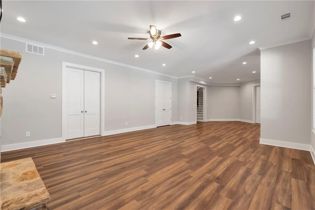 254 Fortress Way Jefferson, GA 30549 - Photo 50 of 69 a view of empty room with wooden floor and fan
