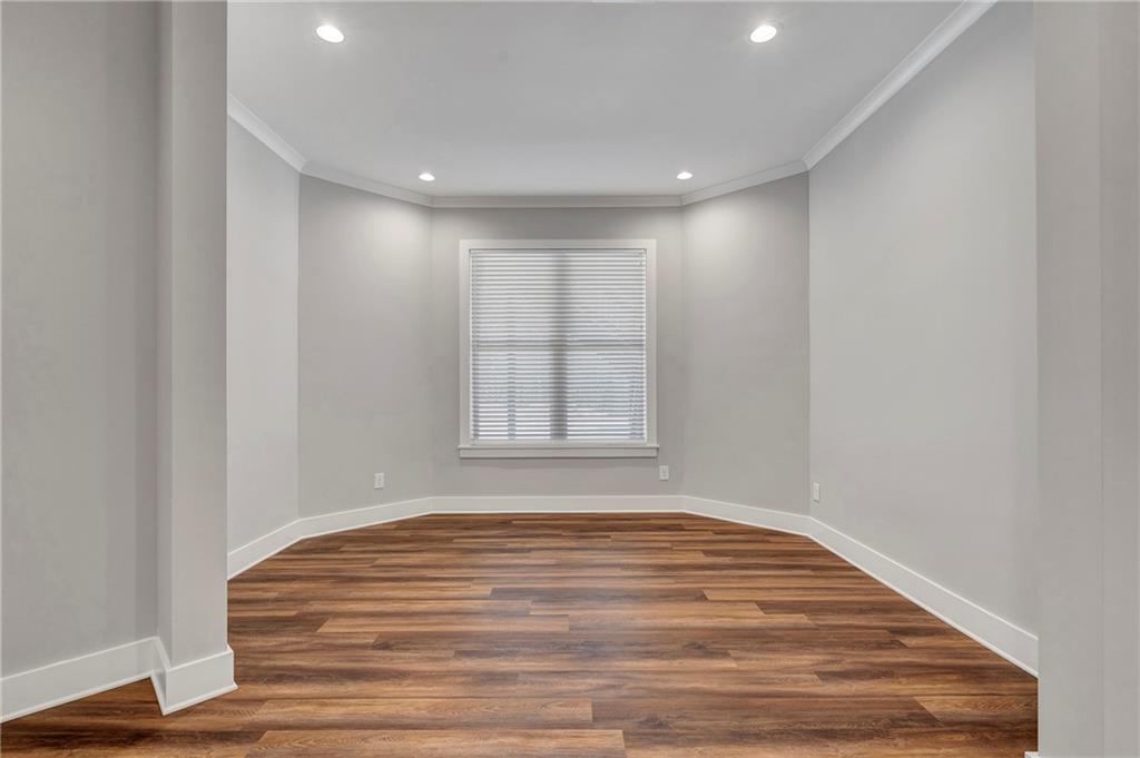 254 Fortress Way Jefferson, GA 30549 - Photo 55 of 69 a view of empty room with wooden floor and fan