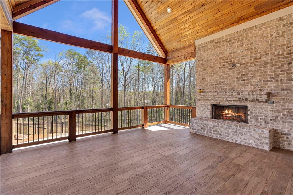 254 Fortress Way Jefferson, GA 30549 - Photo 56 of 69 a view of a porch with a floor to ceiling window
