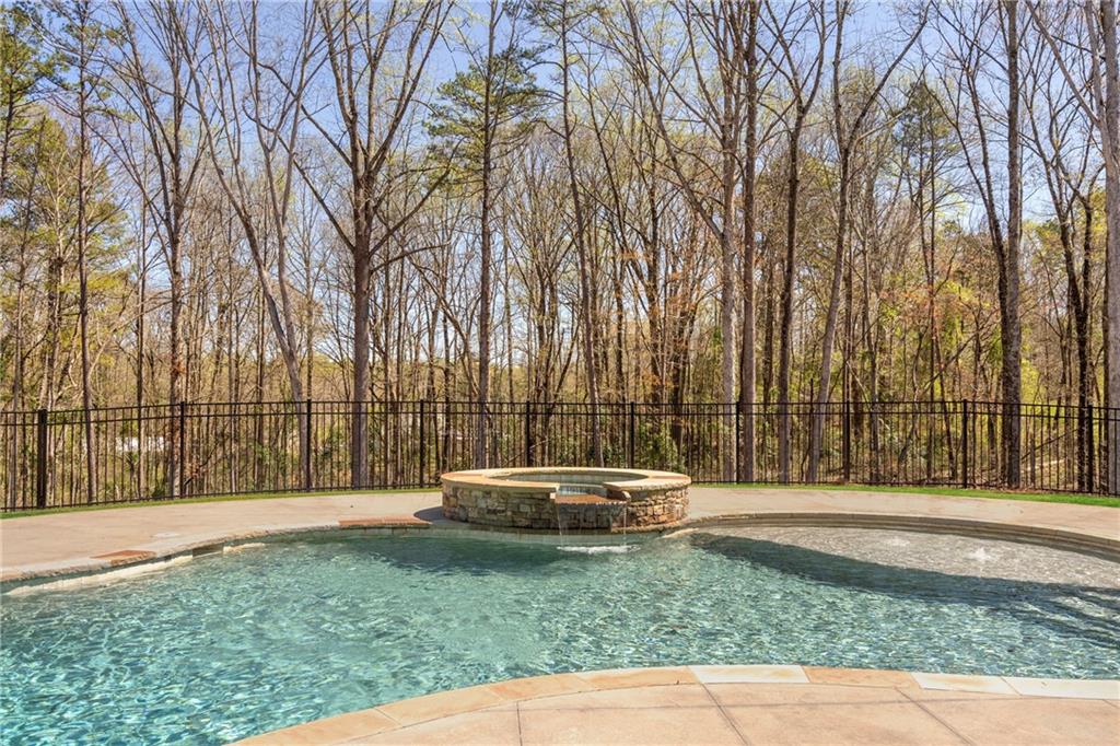 254 Fortress Way Jefferson, GA 30549 - Photo 63 of 69 a backyard of a house with trees