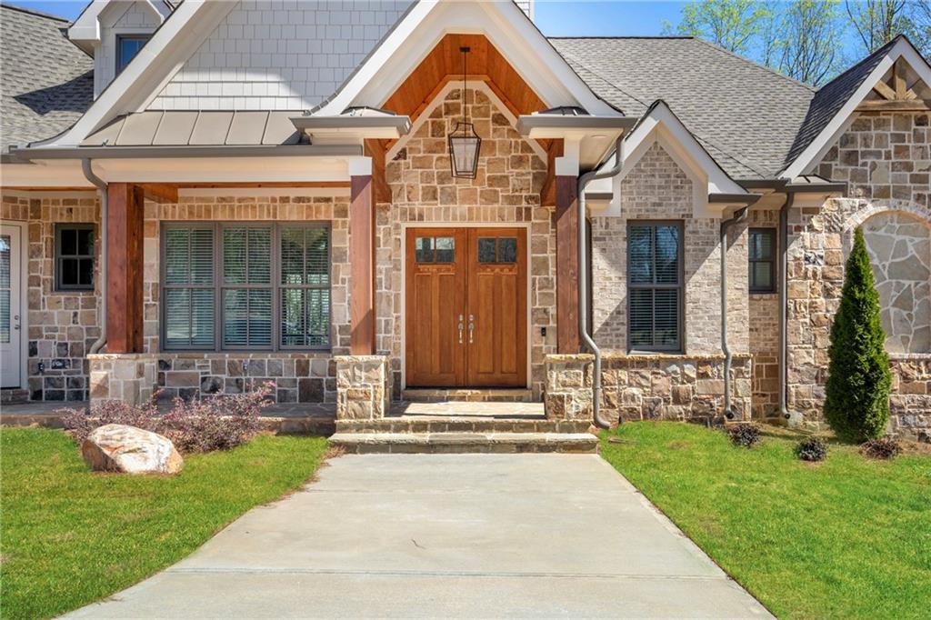 254 Fortress Way Jefferson, GA 30549 - Photo 10 of 69 a front view of a house with a yard