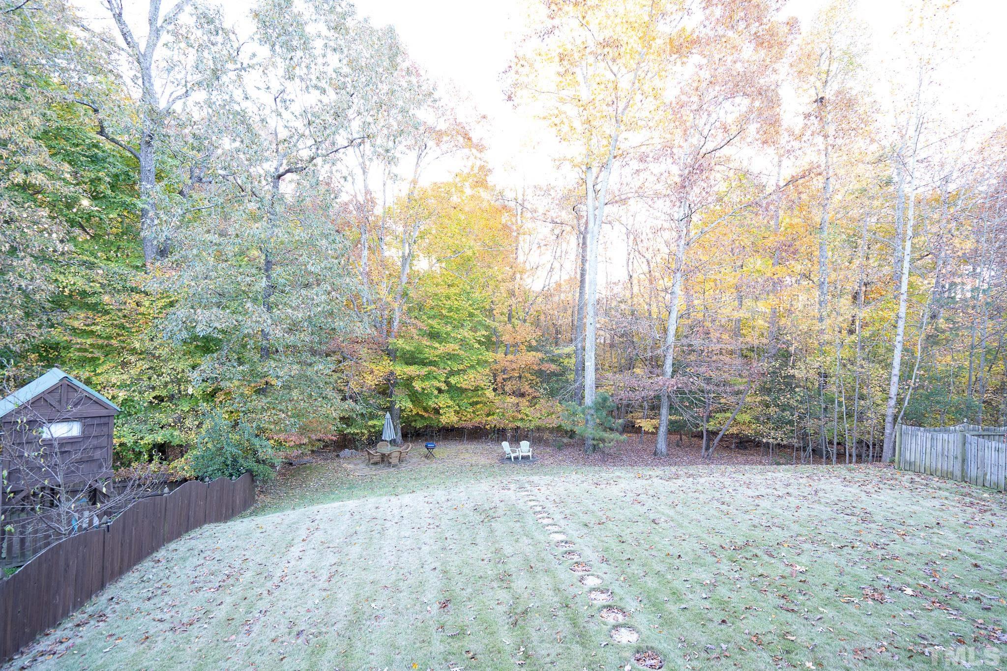 2237 Dunlin Lane Raleigh, NC 27614 - Photo 12 of 13 a view of a garden with trees