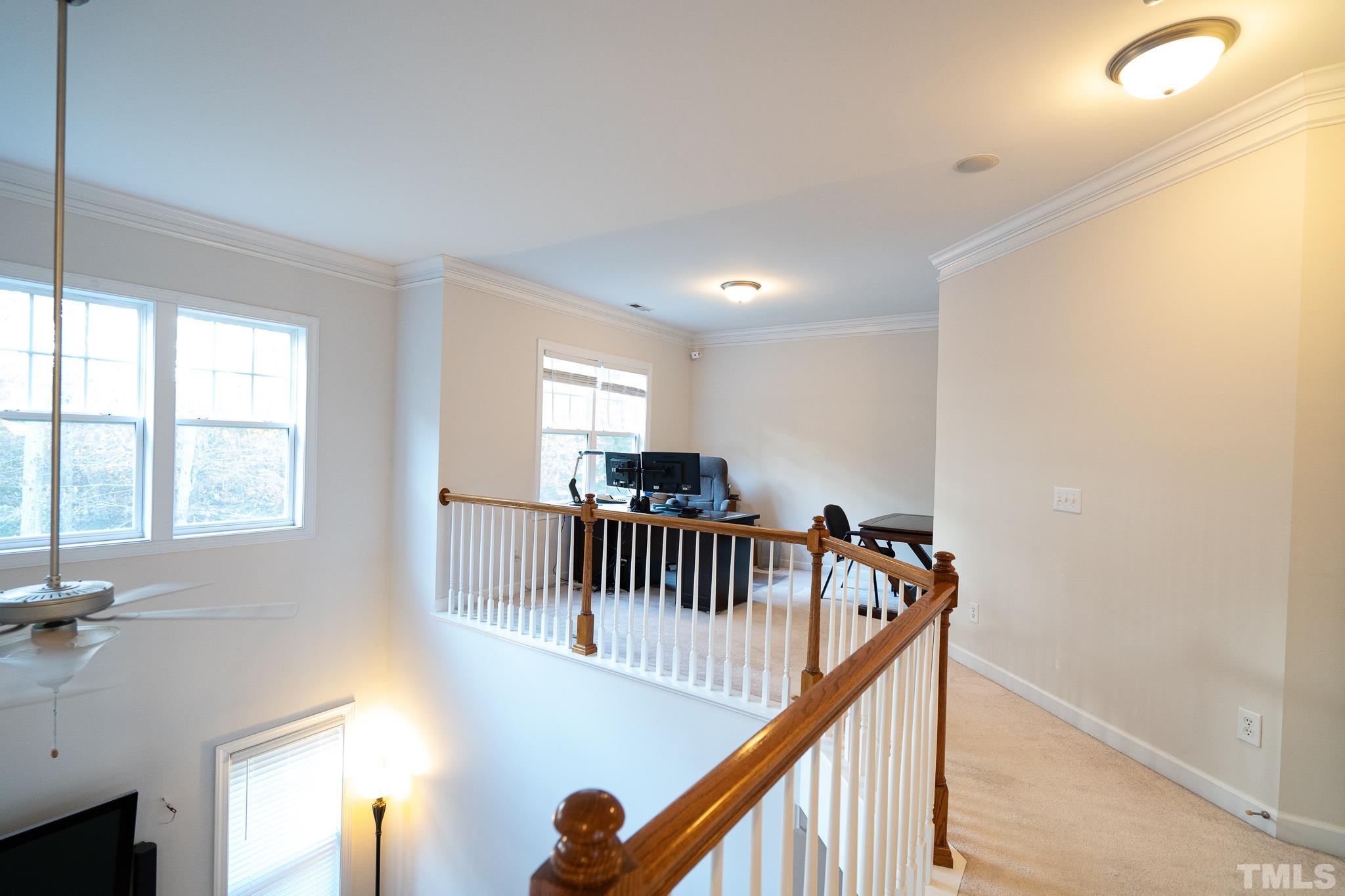 2237 Dunlin Lane Raleigh, NC 27614 - Photo 8 of 13 a view of entryway with wooden floor