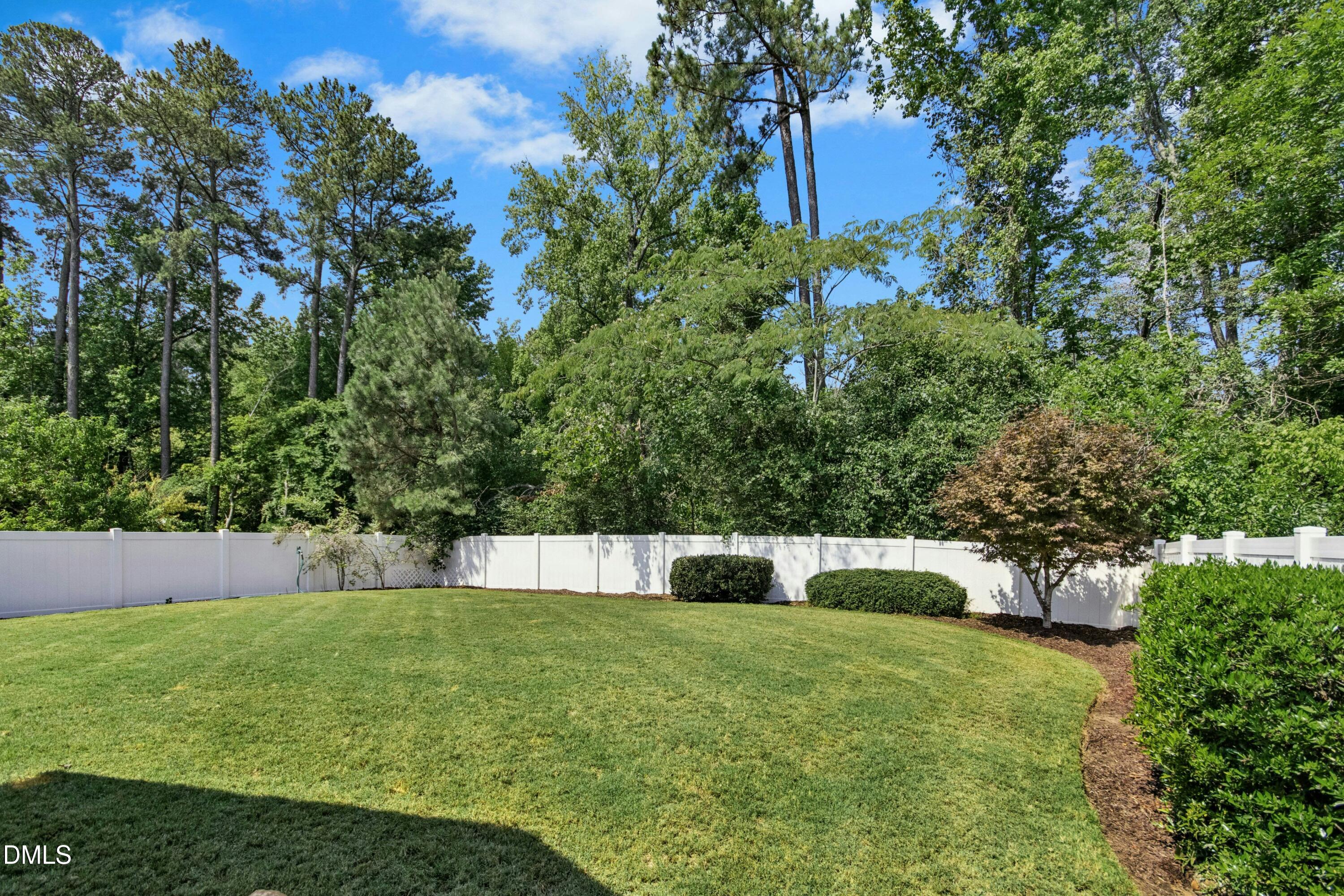 828 Nightshade Way Raleigh, NC 27610 - Photo 22 of 24 a view of green field