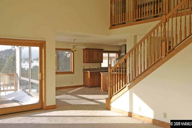 4870 Calavaras Road Reno, NV 89521 - Photo 6 of 9 a view of an entryway with wooden floor