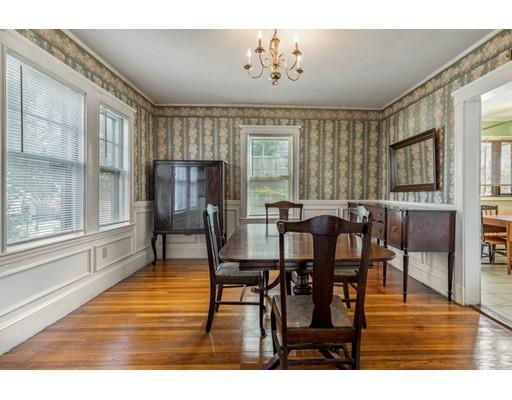 14 Woodbine Road Medford, MA 02155 - Photo 11 of 26 a view of a dining room with furniture window and wooden floor