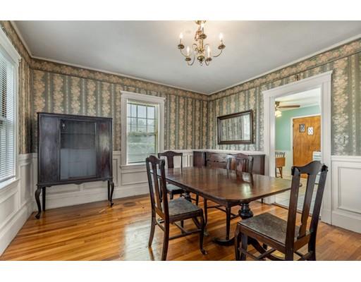 14 Woodbine Road Medford, MA 02155 - Photo 12 of 26 a view of a dining room with furniture and wooden floor